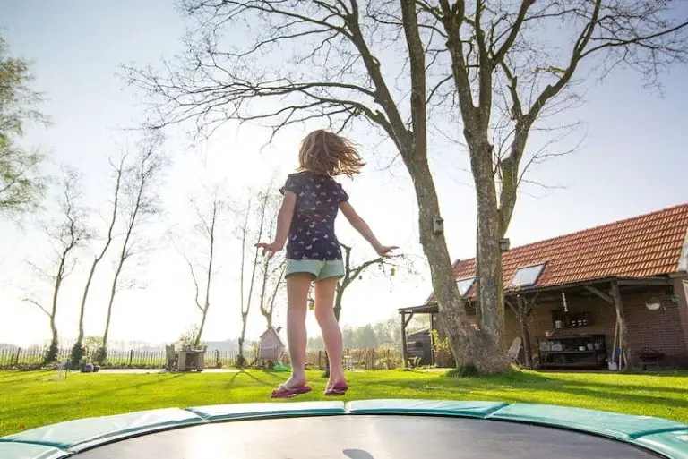 How to Anchor a Trampoline on Artificial Grass? Guide [2023]